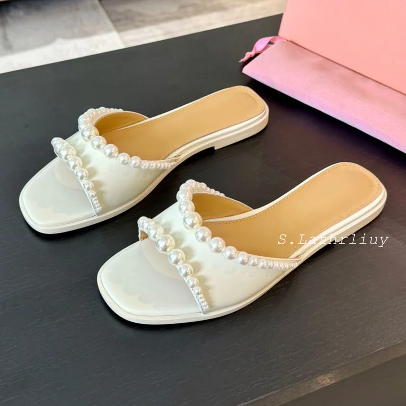 Zapatillas de cuero genuino decoradas con perlas de lujo con punta abierta para mujer, Sandalias planas de Color sólido, zapatos informales para vacaciones para mujer