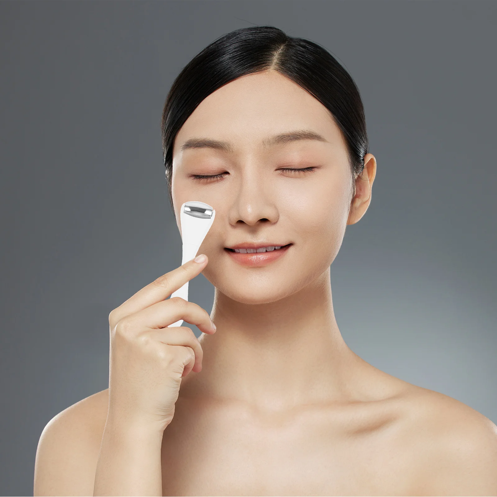 ลูกกลิ้งนวดตา เครื่องมือดูแลผิวหน้าที่ทนทานสำหรับบรรเทาอาการบวมผู้หญิงเครื่องนวดผิวหน้าเครื่องมือนวดตา