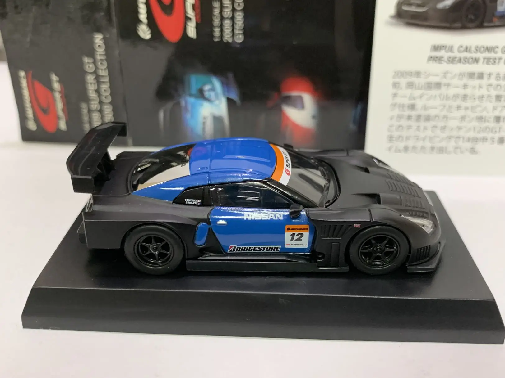 Kyosho 1:64  IMPUL Calsonic GT-R  NISMO Collection of Die-casting Simulation Alloy Model Car Children Toys