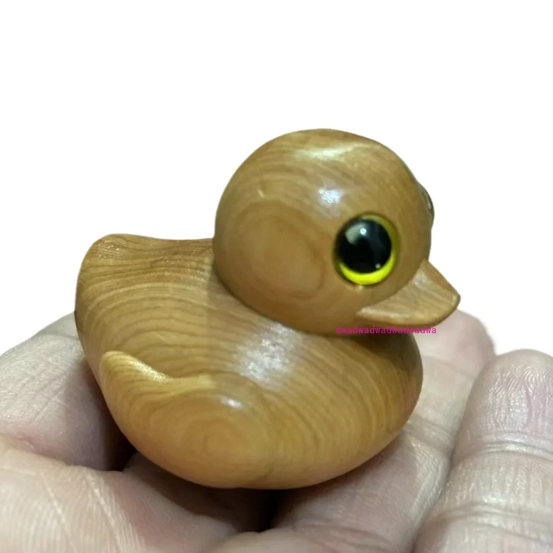 Wood carving explosion small yellow duck revision middle finger version small medium small yellow duck factory