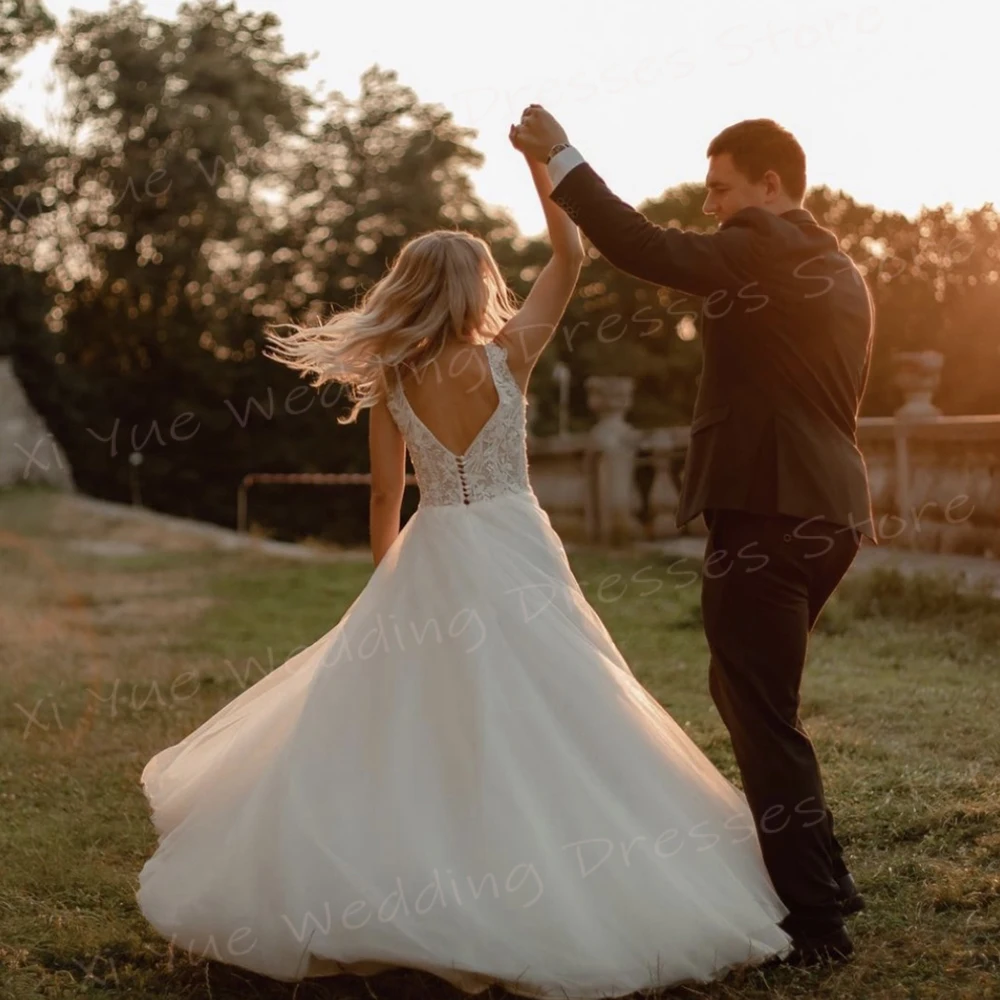 Gaun pernikahan wanita garis A menawan gaun pengantin renda applique anggun gaun pengantin seksi leher V tanpa lengan punggung terbuka Vestido De Noivas