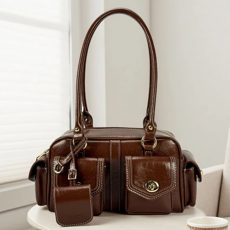 

Винтажные сумки-подушки Boston для женщин, роскошные дизайнерские сумки и кошельки, новинка 2025 года, с замком из искусственной кожи, верхняя ручка, маленькая подмышка, плечо