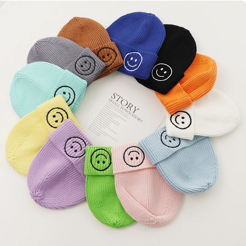 Children autumn winter new knitted wool hat Korean plate embroidery smiling face pullover hat candy colored boys and girls hats