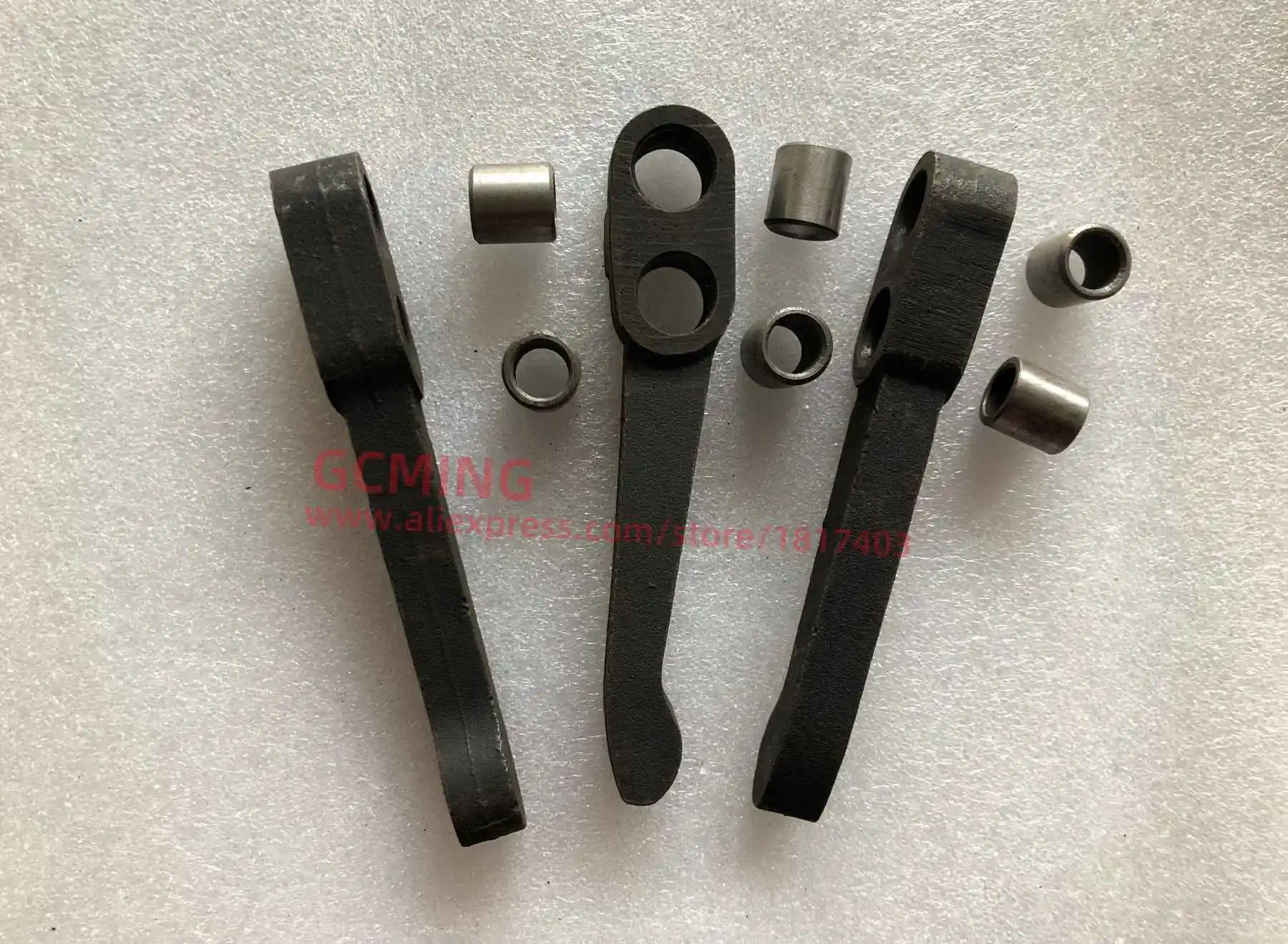 JINMA 304.21S.130 Release Lever + 184.21S.129 Bush, the 10'' three-finger dual-stage clutch, JINMA / JM 30 - 35HP Tractor Parts