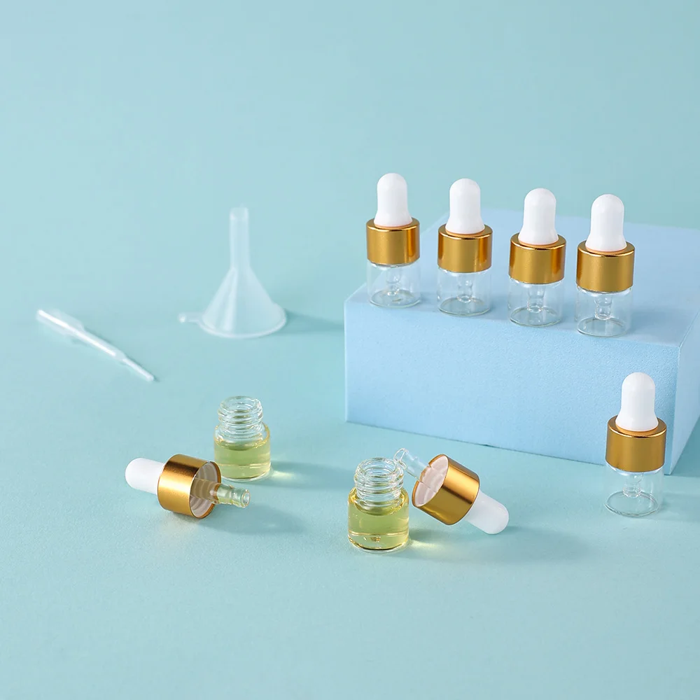 100 peças 1ml tampa dourada frascos conta-gotas vazios de vidro conjunto com 24 pipetas 24 funis-garrafas recarregáveis à prova de vazamento para cosméticos de essência