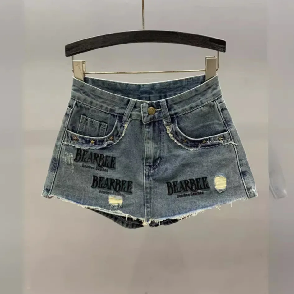 [ZOCI] Broken Hole Printed Rough Edge Girl Denim Shorts Women 2024 Summer New High Waisted A-line Wrapped Hip Skirt