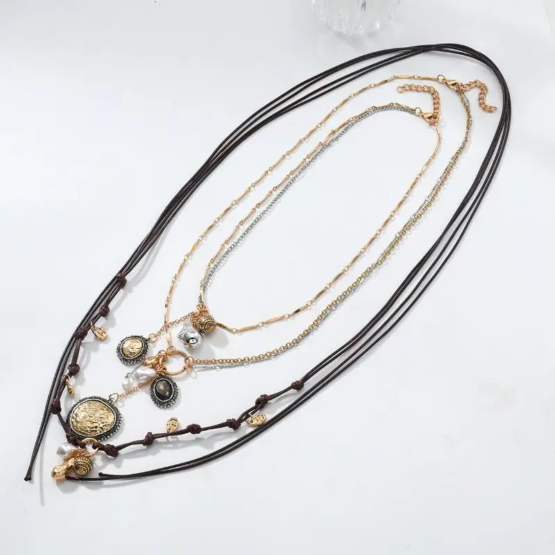 قلادة احتفالية بسلسلة حبل بوهيمية أنيقة للنساء؛ إكسسوار شارة معدنية مستديرة للعملات المعدنية.