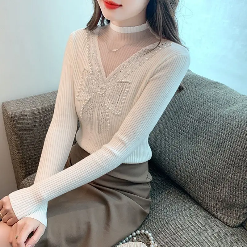 

High quality autumn and winter new fashion heavy industry beading studded hollowed out collar slim knitted sweater