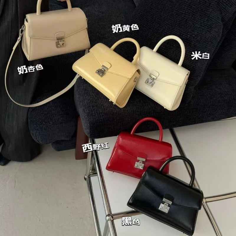 

Элитная модная сумка, изысканная и компактная сумка-коробка, нишевая сумка с квадратным замком и клапаном, универсальная сумка через плечо.