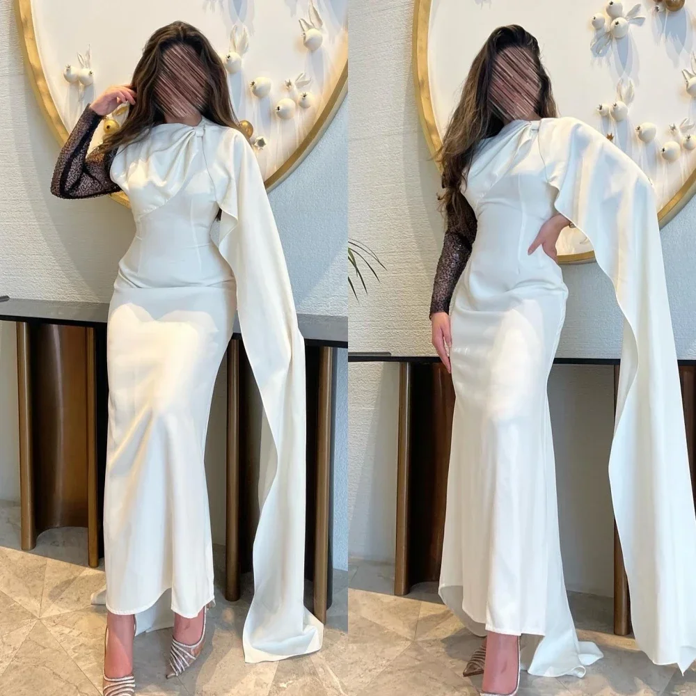 

Платье для выпускного вечера по индивидуальному заказу. Изысканное платье-футляр с высоким воротником и бантами. Тюлевые юбки длиной до пола. Вечерние платья Charmeuse.