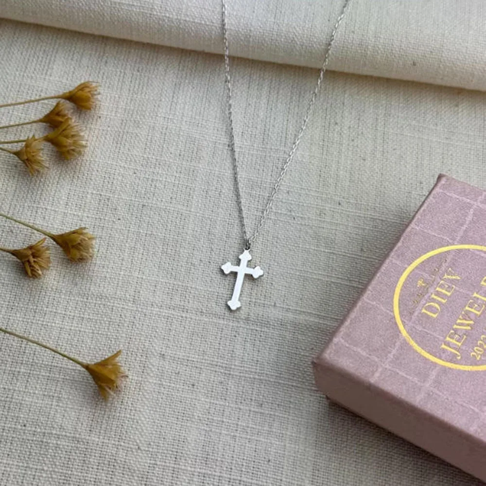 

Stainless steel cross necklace, simple style, can be used as a baptism necklace or a confirmation gift.