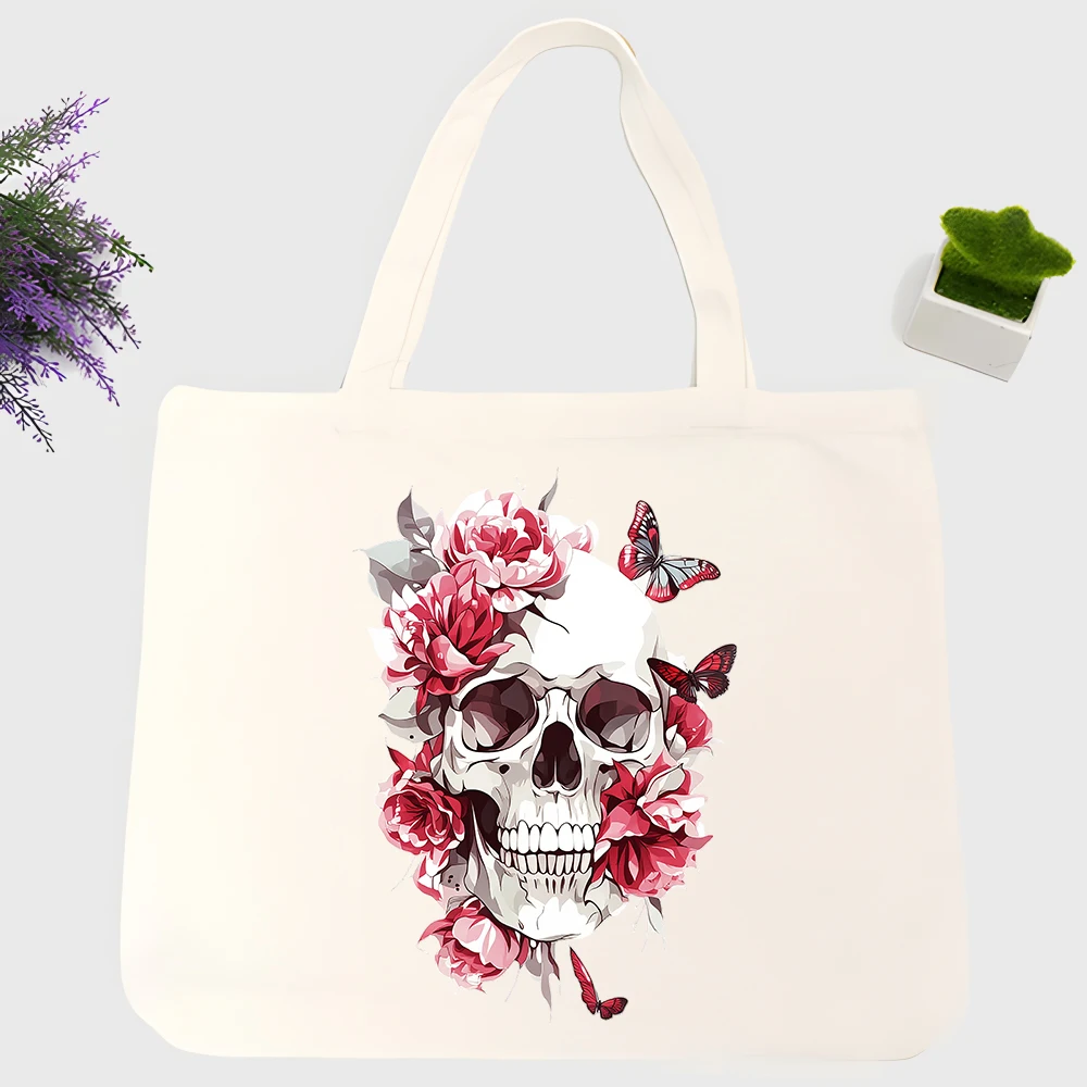 Women's skull and floral graphic canvas tote bag, artistic print for casual daily use and weekend outings