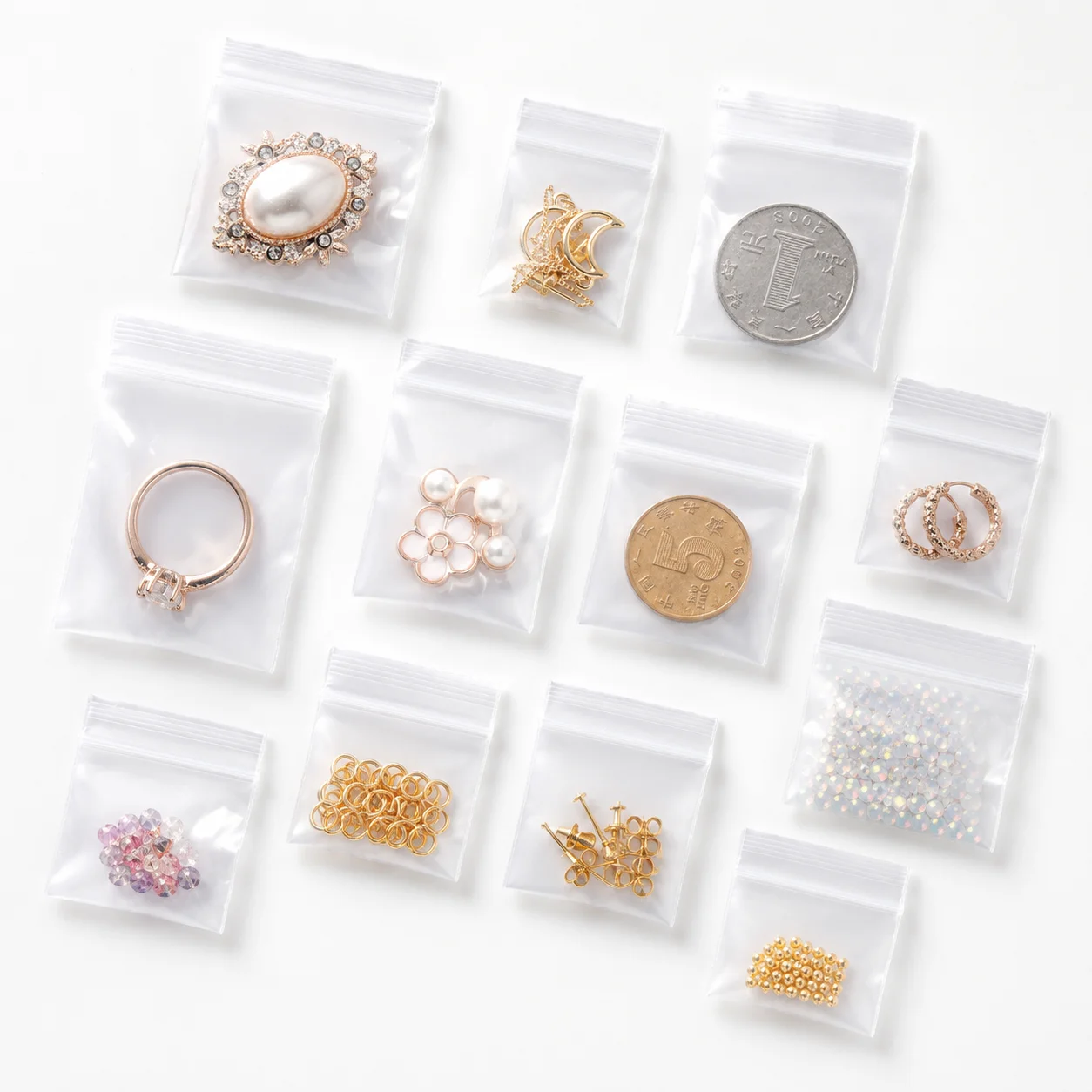 100 Stück Transparente Kleine Zip-Beutel Wiederverschließbare Polyethylen-Plastiktüten zur Aufbewahrung von Schmuck, Accessoires, Perlen und Handarbeiten – Detail 5