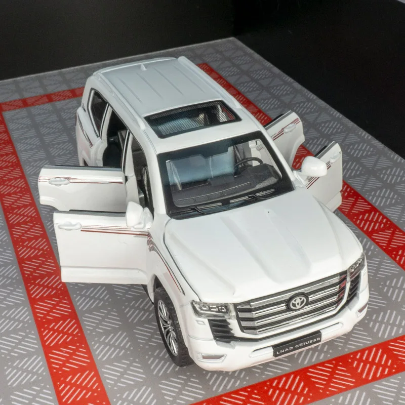 1:32 Land Cruiser LC300 remolque SUV aleación modelo niño acústico-óptico tirar hacia atrás jeep regalo de cumpleaños