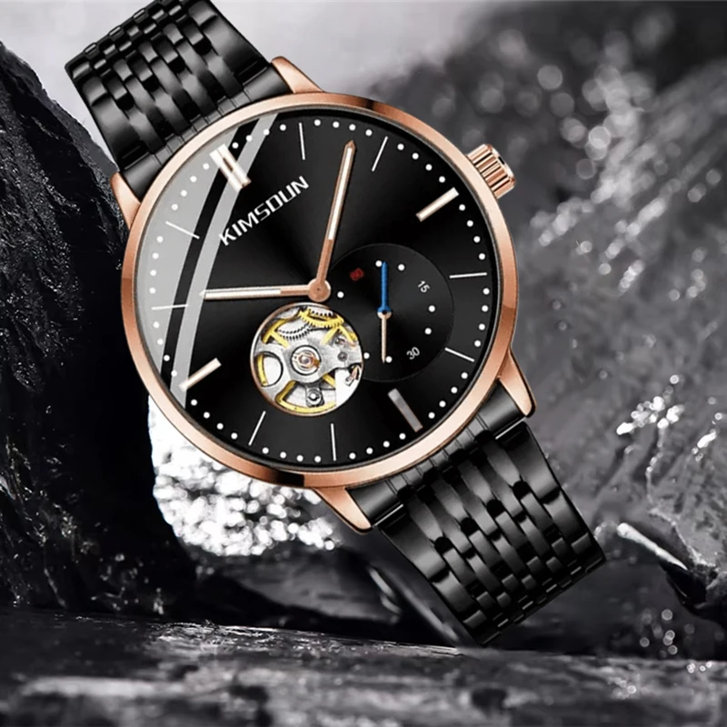 

A men's black steel strip luminous design hollow tourbillon business style trendy high-end fully automatic mechanical watch