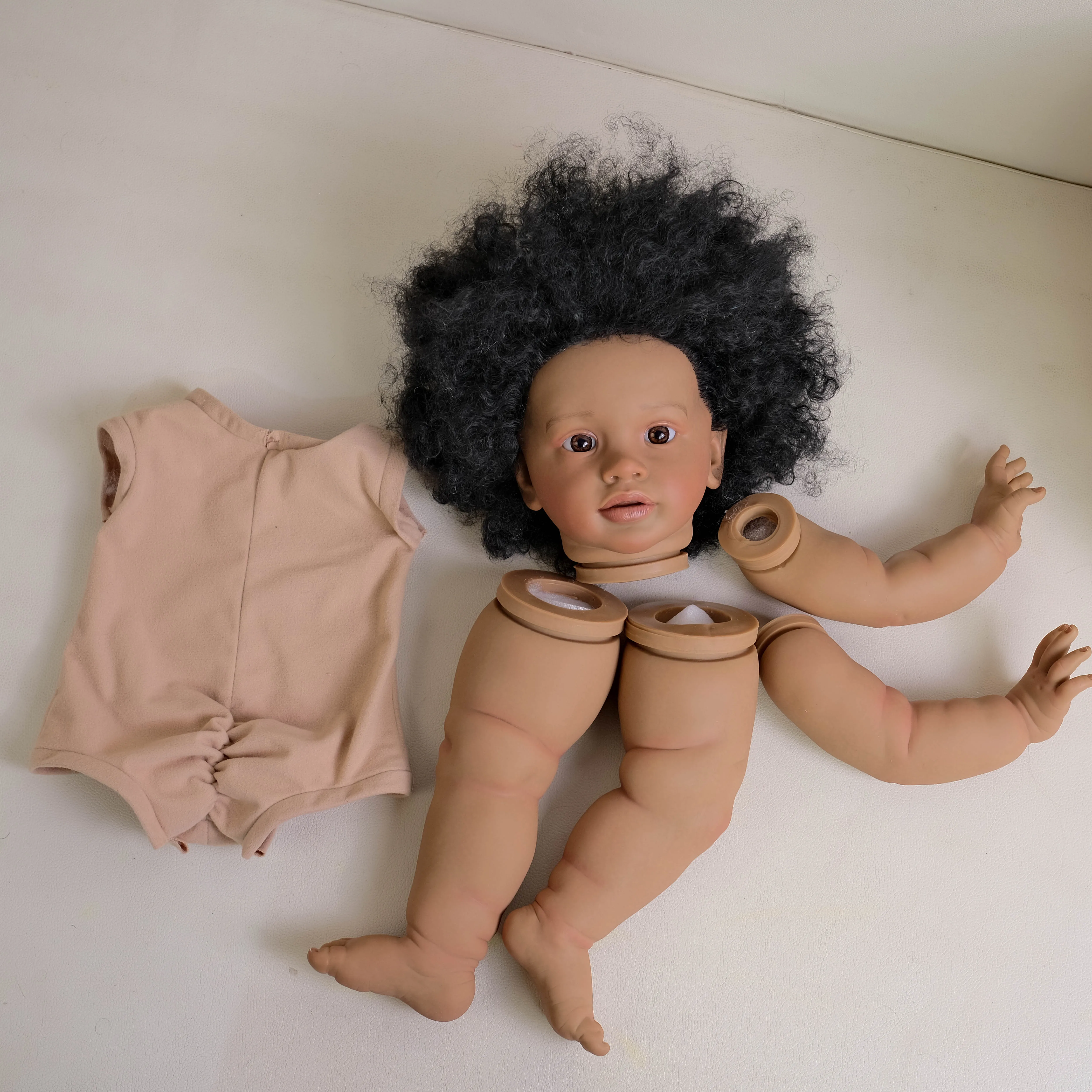 NPK 26-inch Pippa Unfinished Reborn Doll Kit Dark Brown Skin Lifelike DIY Toy Doll Parts with Curly Hair Painted