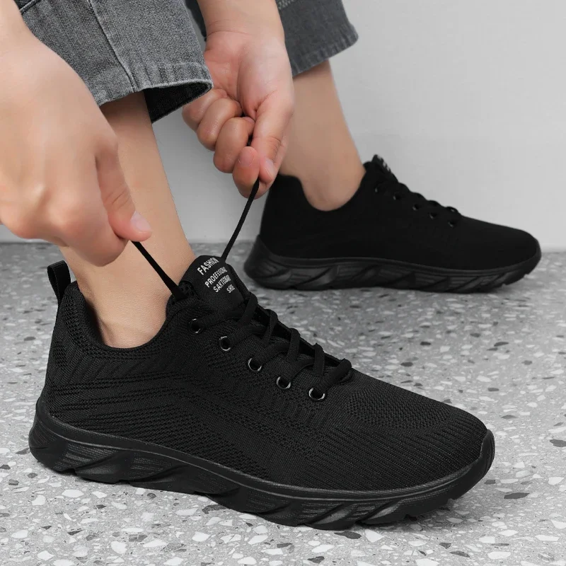 2024 summer hot men's black flying knitting breathable non-slip classic casual sports shoes manufacturers direct sales