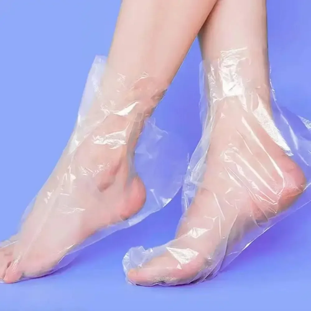 100/200 Uds. Calcetines desechables para hidratar los pies, bolsas transparentes para pies, cubiertas de PE para SPA de pies, removedor de callos, herramientas de pedicura para el cuidado de los pies