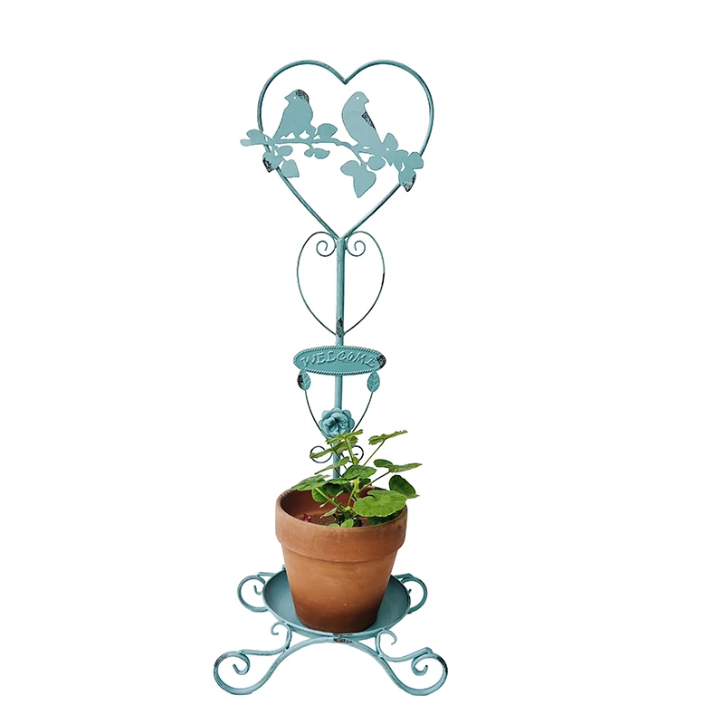 

American rural retro old wrought iron flower stand French shelf outdoor gardening green plant climbing pergola decoration
