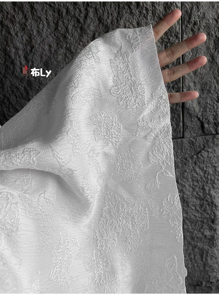 white-floral-3d-jacquard-textured-fabric-for-designer-luxury-dress-gown-bag-coat-sewing-material