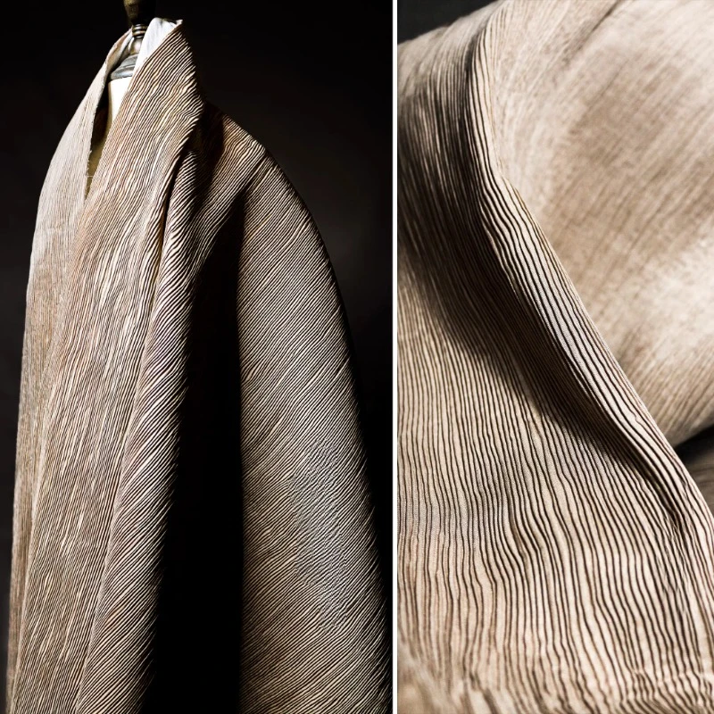 Camel colored corrugated paper pleated with a crisp texture composite pleats creative art designer fabric