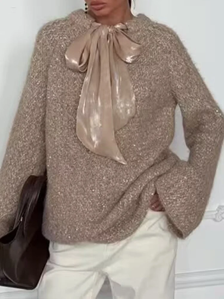 

New European-style women's fashion sweater, versatile and stylish, featuring a ribbon embellishment and knitted design.