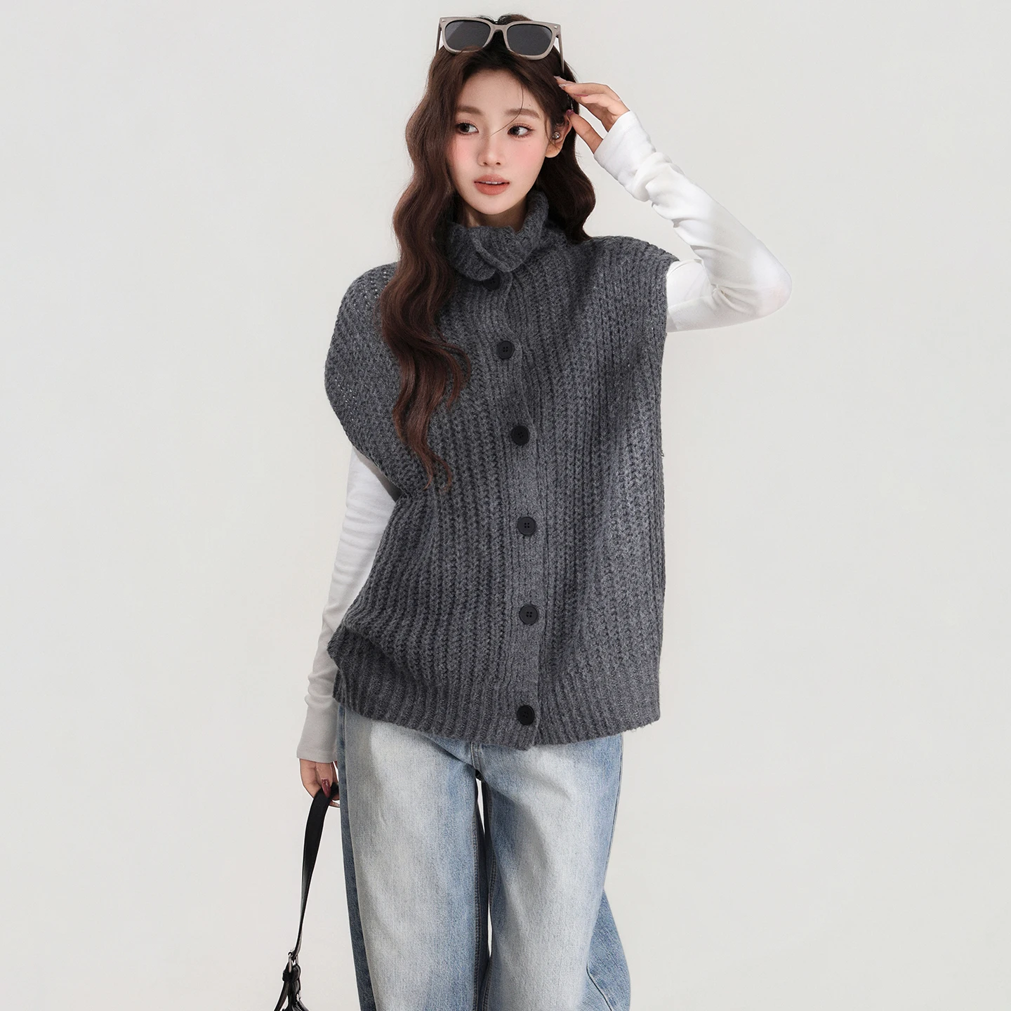 Chaleco de punto retro sin mangas para mujer en otoño e invierno, chaleco suelto y adelgazante, versátil y de alta gama