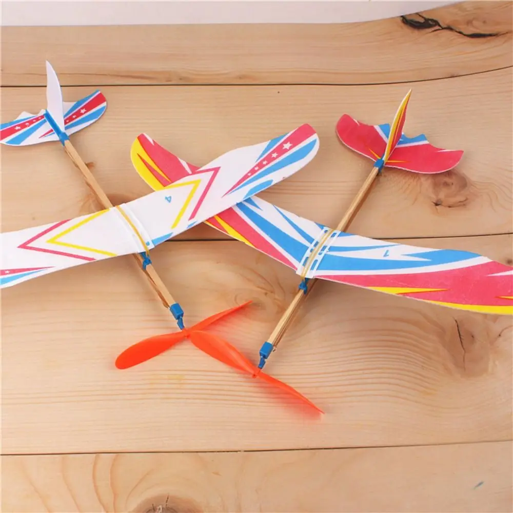 

DIY Hand Throw Flying Glider Planes Random Color Assembly Model Elastic Rubber Band Powered Flying Plane Airplane Glider