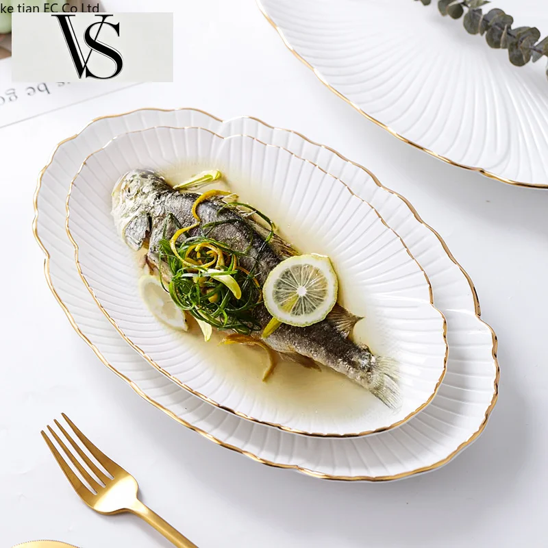 Assiette de service ovale créative en céramique pour la maison, assiettes en céramique haut de gamme européennes pour hôtels et restaurants, plat à poisson vapeur en céramique à bords dorés