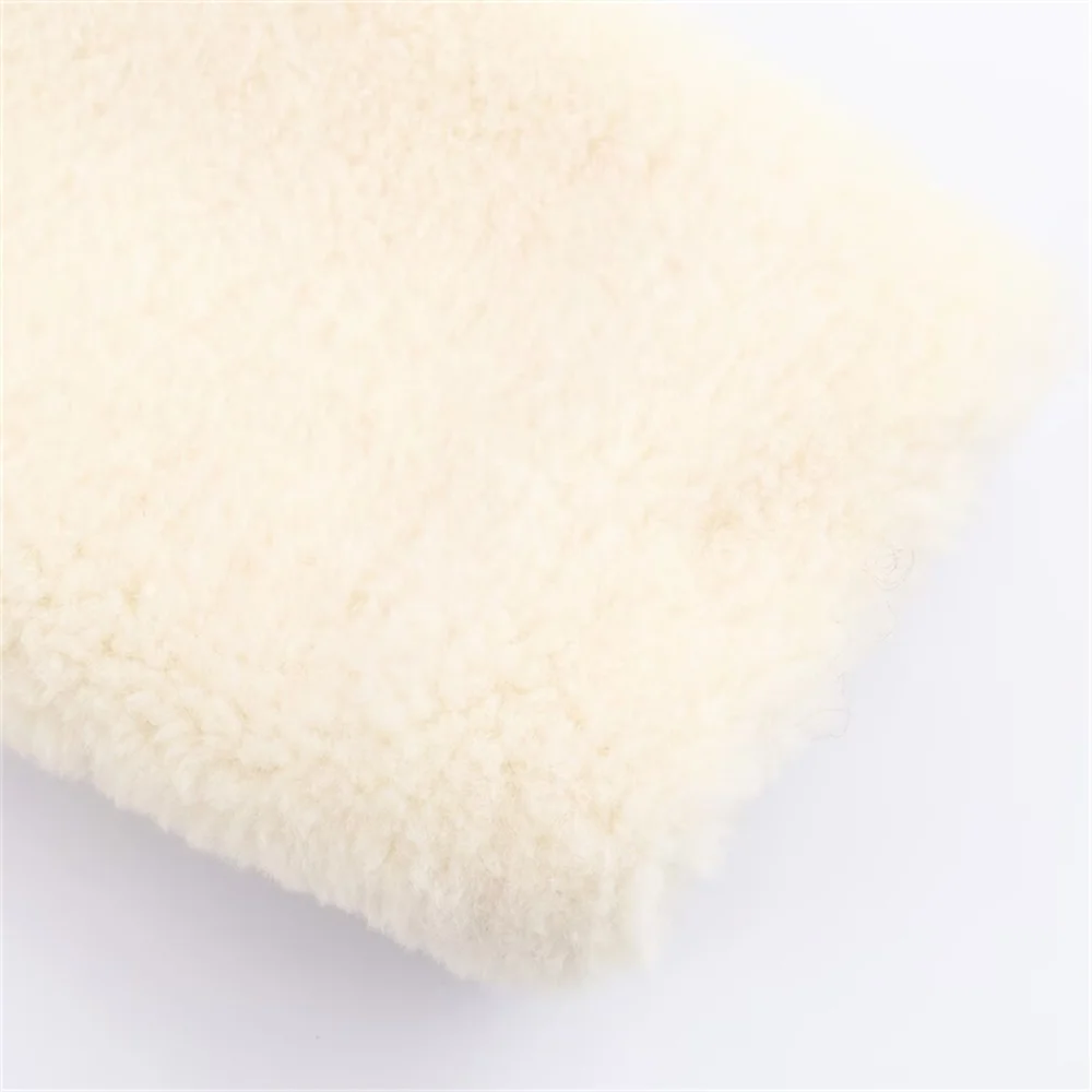 Herfst en winter nieuwe dameskledingstijl veelzijdige revers lange mouwen riem decoratie kunstbontjas