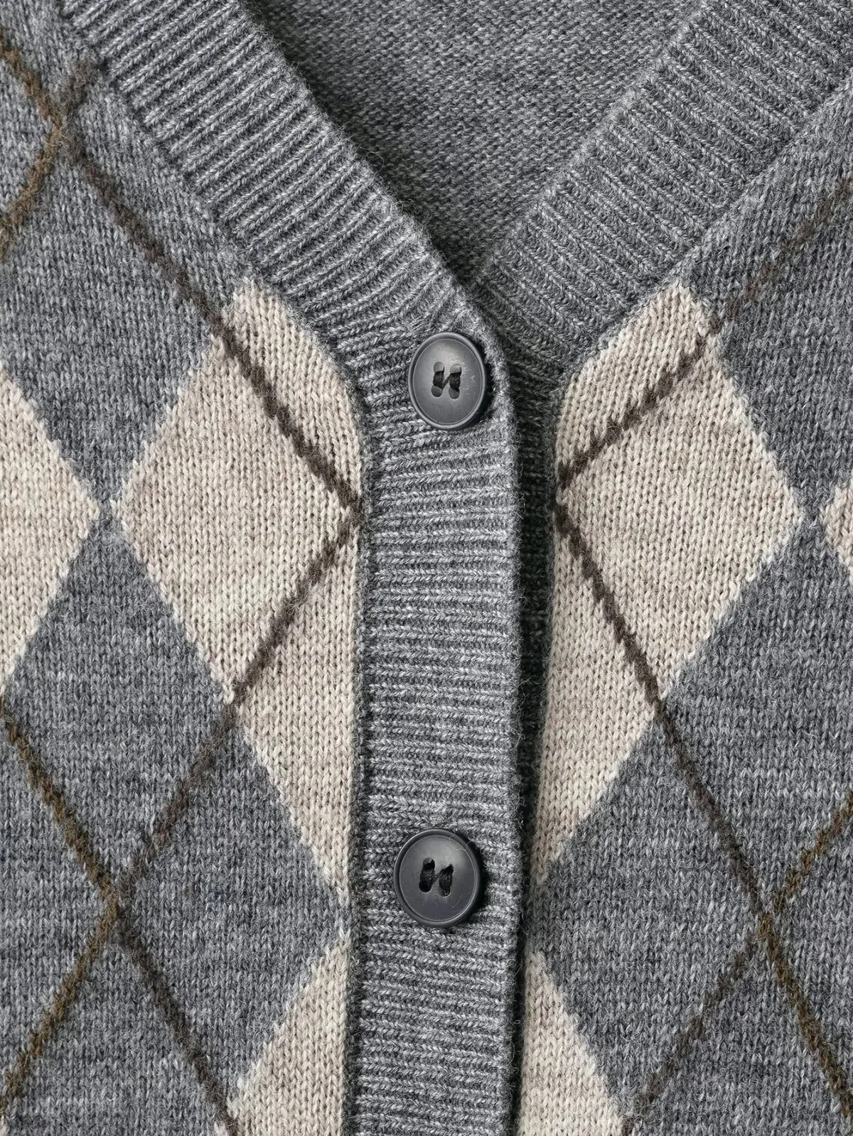 Nieuwe herfstvest voor dames Stijlvolle knoopsluiting V-hals Lange mouwen Slim-fit gebreide geruite trui Streetstyle damestop