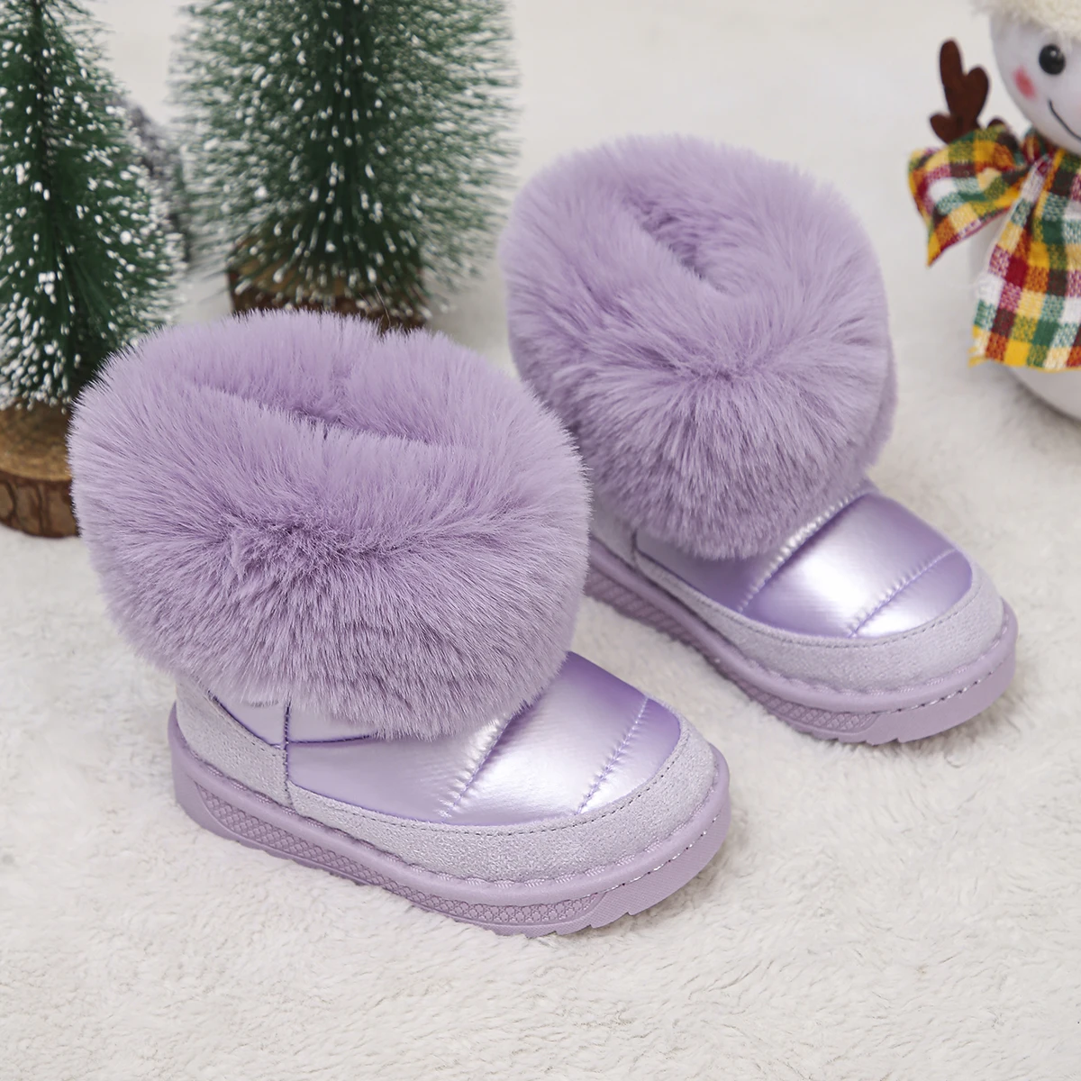 A Pair of Cute Girls' Snow Boots in Soft Purple with Plush Lining, Comfortable and Rainproof