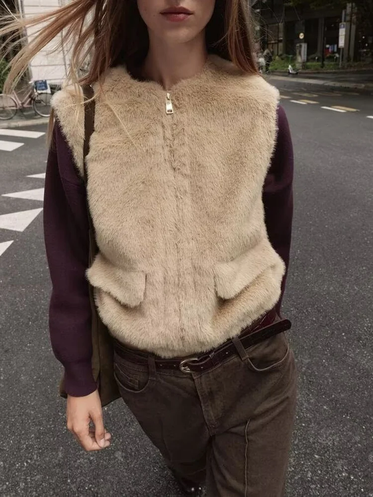 

Новая женская мода в европейском стиле, универсальный и элегантный повседневный жилет без рукавов с круглым вырезом и меховой отделкой.