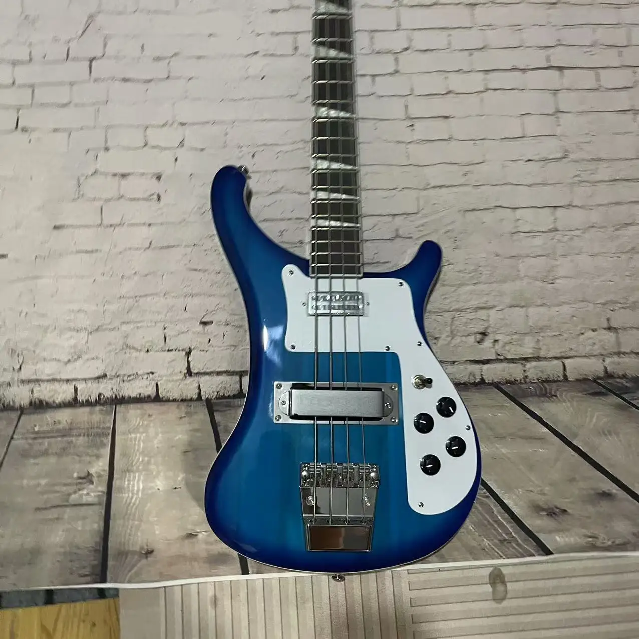 RickenBacker electric bass with 4 chords and a gradient blue body. Factory photos of the shipped bass are available for immediat