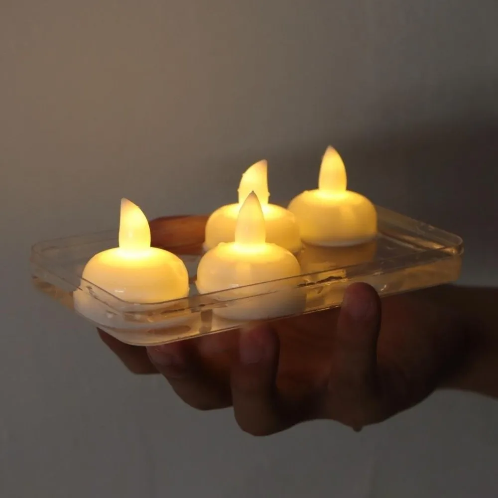 

LED Floating Electronic Candle Light Sensor-activated Warm White Flash Floating Sensor Candle Light Faux Candle Lamp