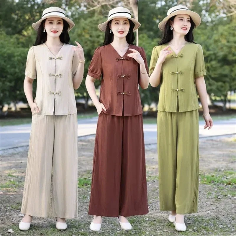 

Summer Middle Aged Mother Buckle Wide Leg Pants Outfit 2025 Female Fashion Large Size 4XL 2PCS French Women V-neck Two-piece Set