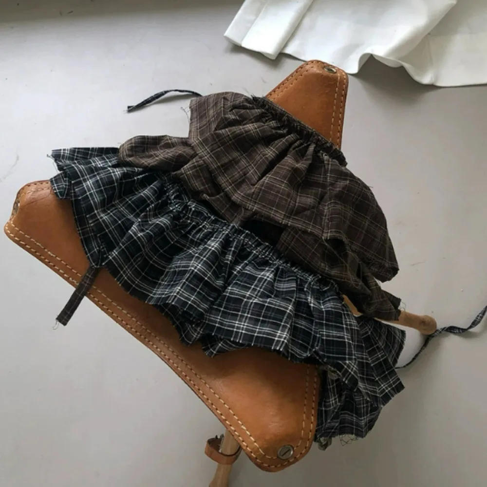 ヒップホップ レイヤード衣装 チェック柄スカート シャツエクステンダー Y2K レースアップ ヒップスカーフ 韓国スタイル スイート フリルエッジ ウエストバンド