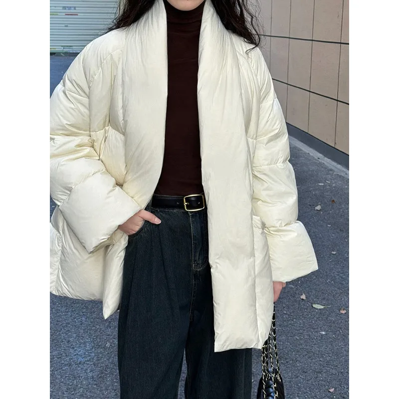 The New Loose and Warm Cotton-padded Jacket with Retro Design Cinched Waist and Large V-neck Is Trendy Winter Fashion for Women
