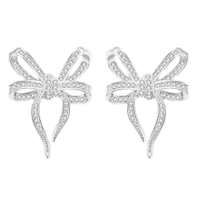 Huitan – boucles d'oreilles en forme d'arc pour femmes, exquises, scintillantes, en zircone cubique, romantiques, bijoux tendance pour mariage