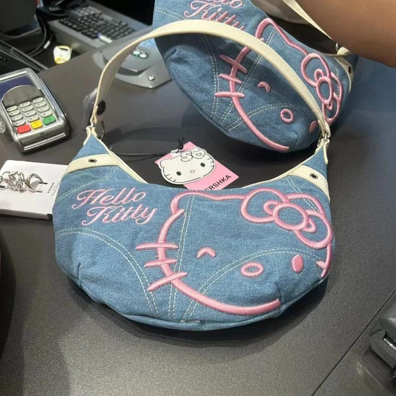 Sanrio Hello Kitty Сумка в форме полумесяца Симпатичная сумка на плечо с мультяшным принтом и вышивкой Ретро Джинсовая сумка в форме полумесяца Большая вместительная женская сумка Подарки