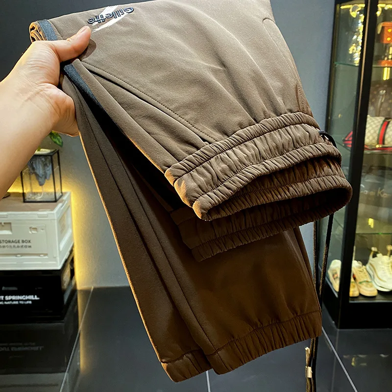 Men's sports pants autumn and winter fashion trend stripes design loose elastic ankle-tied light luxury casual sweatpants