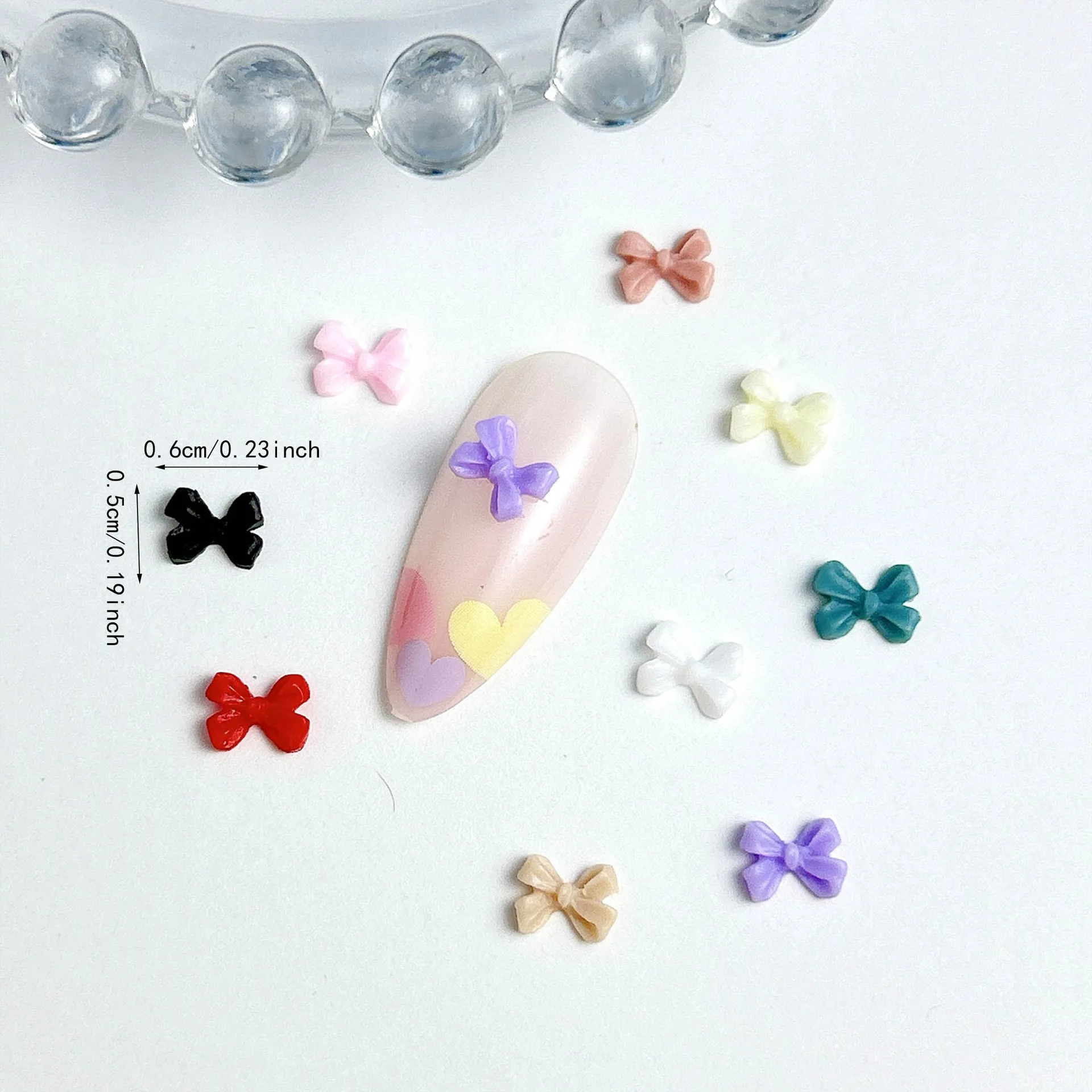 100 unidades de Mini lazo para uñas, dijes de resina, joyería 3D, lazo de colores mezclados, accesorios de decoración de uñas japoneses, suministros, piezas bonitas para decoración de uñas DIY