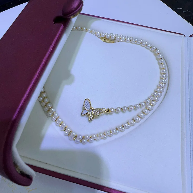 

New Butterfly Buckle Sweater Chain Pearl Necklace Women's Fashion Accessories High-end Elegant