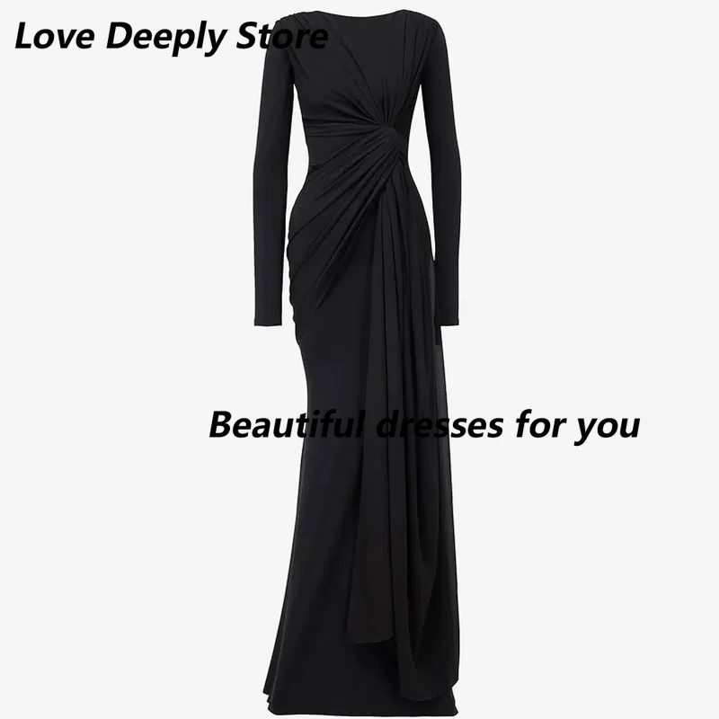 فستان سهرة رسمي مخصص بأكمام طويلة حورية البحر ورقبة دائرية باللون الأحمر من الجيرسيه بطول الأرض وطيات وسحاب خلفي للمشاهير