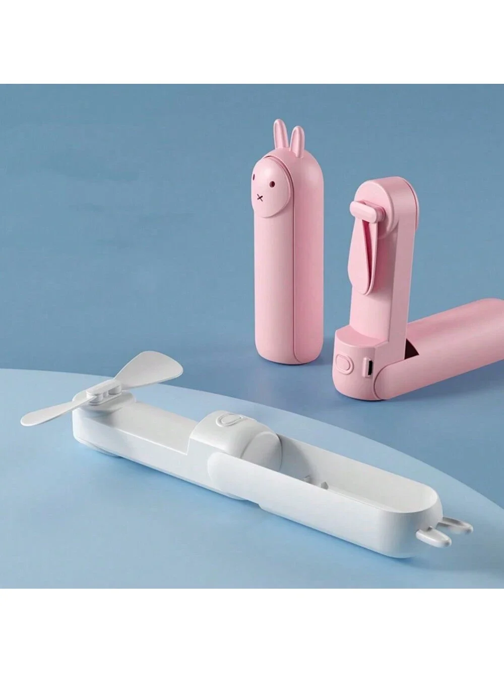 พัดลมพกพาขนาดเล็ก 1 ชิ้น USB ชาร์จคูลเลอร์พัดลมตั้งโต๊ะมือถือพับได้พร้อมการออกแบบพับได้ที่เงียบสงบและธนาคารพลังงานที่มีประโยชน์