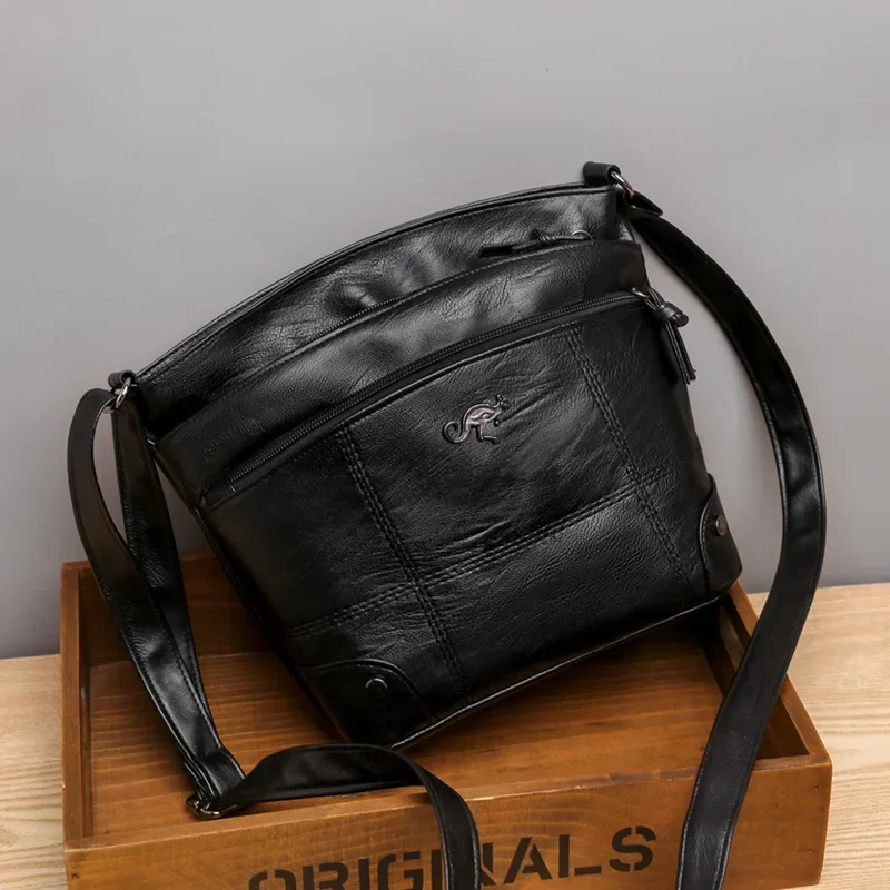 Bolso con textura de cuero suave para mujer, bandolera, nuevo bolso de hombro a la moda, tendencia Simple europea y americana, Retro, múltiples bolsillos