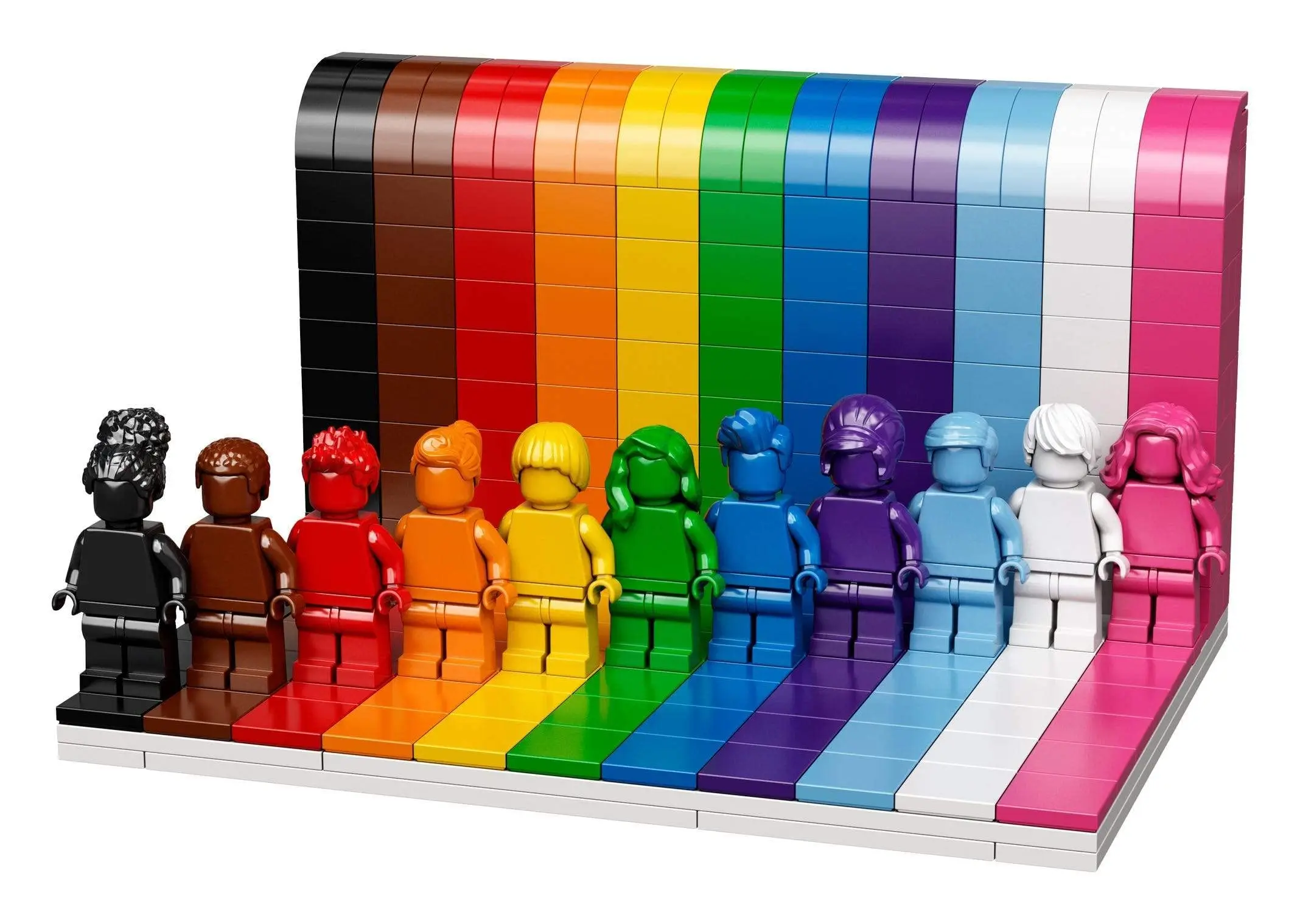 LEGO Everyone Is Awesome 11 Monochrome Minifigures with Color Hairstyle Against A Background of Corresponding Rainbow Stripes