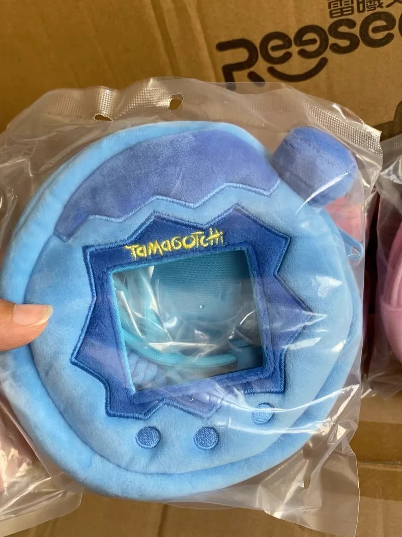 Auf Lager Bandai Tamagotchi Paradise Elektronische Haustiermaschine Plüsch Aufbewahrungstasche Memetchi Mimitchi Plüschtier Anhänger Kopfhörertasche