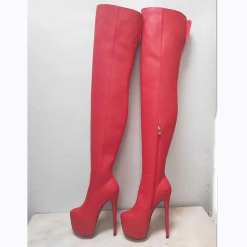 Fashionable women's boots. About 15 cm high heels. Fashion show banquet shoes. Over knee high women's boots. Round toe pumps.