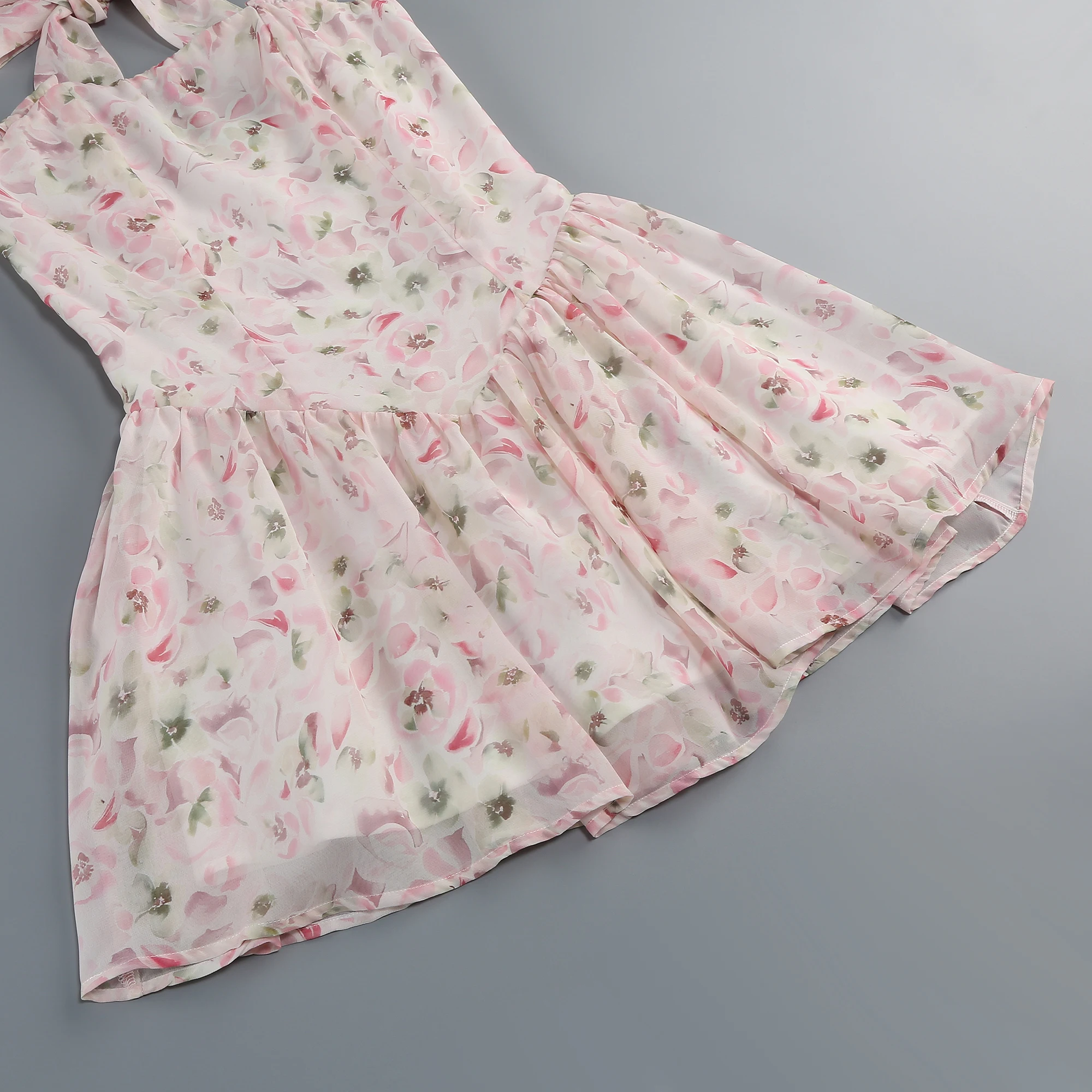 Light luxury celebrity summer vacation beach short floral dress with neck hanging design, fairy dress